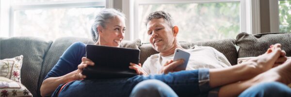 couple looking at tablet