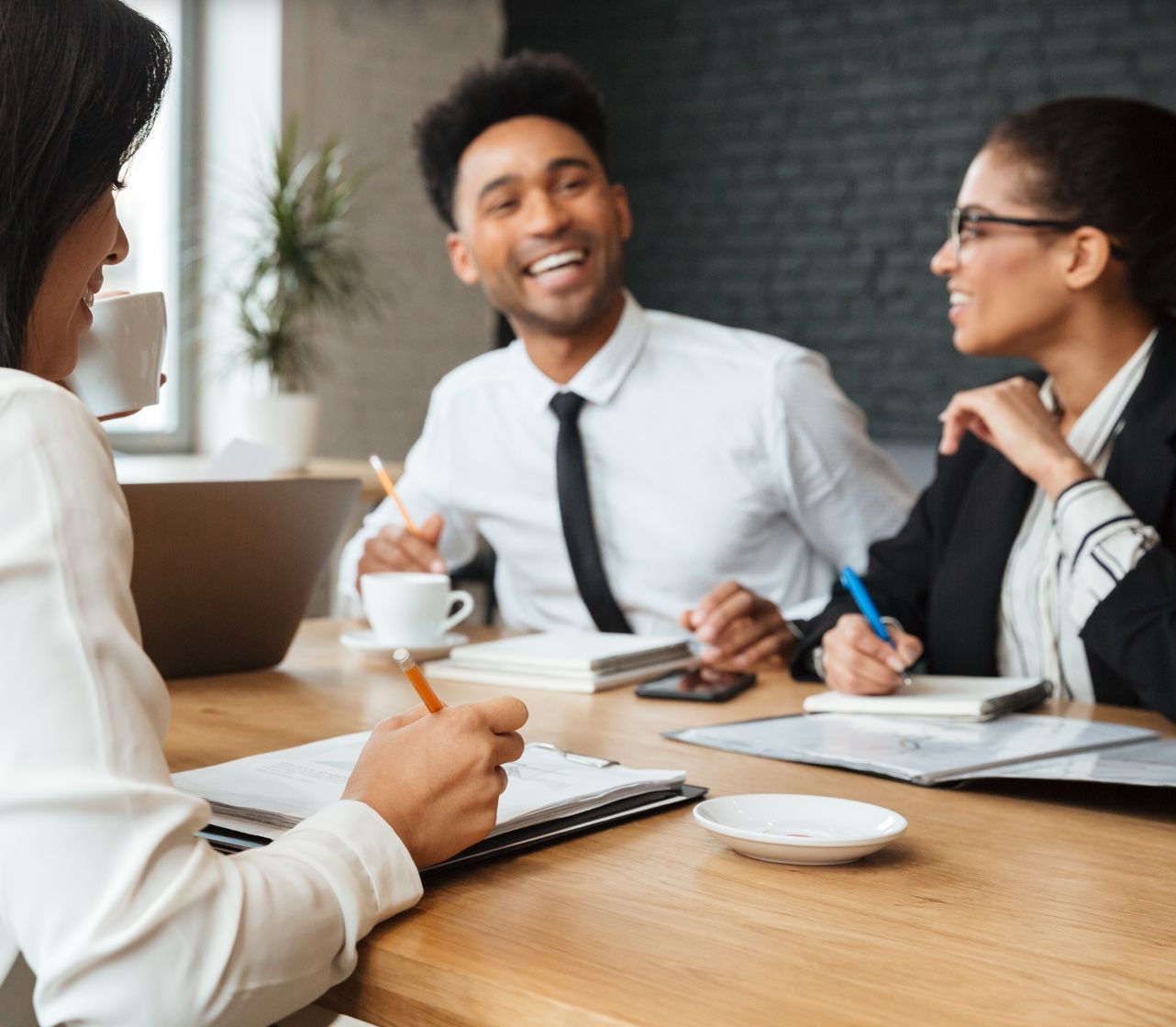 coworkers talking laughing